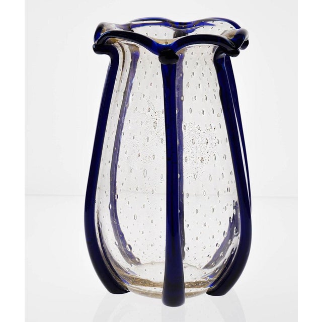 Large Murano Vase with vertical beads in Cobalt blue and baloton regularily spread bubbles in the clear part. The clear...