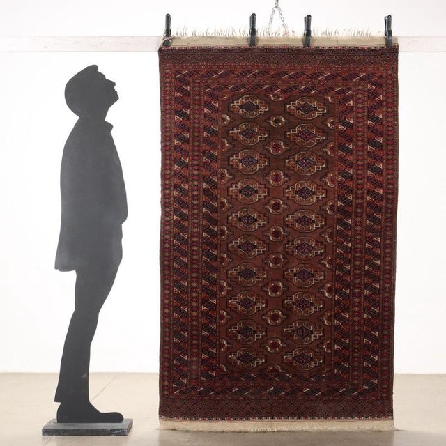 Bukhara wool carpet, fine knot, manual production. This piece is attributed to the mentioned designer/maker. It has no...