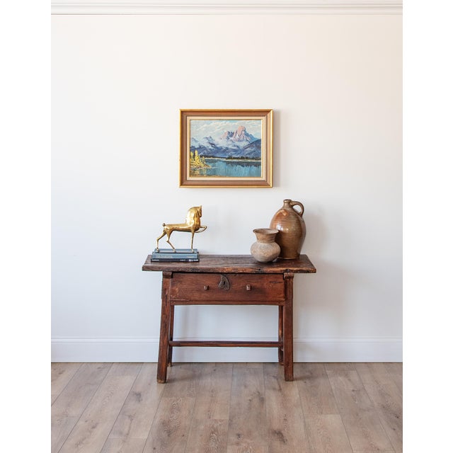 This beautiful antique French table is a classic example of humble provincial craftsmanship, prized for its honesty of...