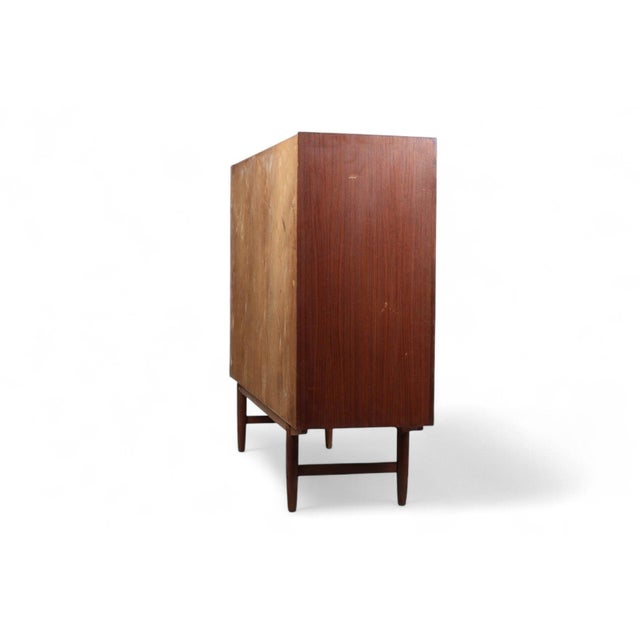 Origin: Denmark Designer: Unknown Manufacturer: Unknown Era: 1960s Materials: Teak Measurements: 59″ wide x 17.25″ deep x...