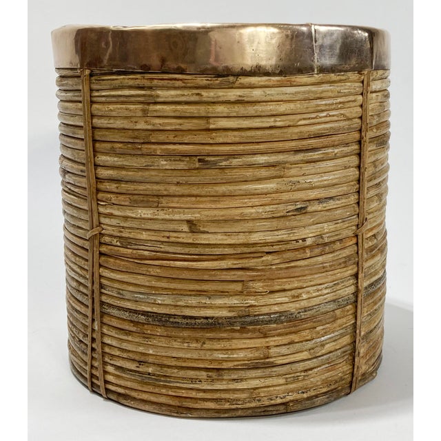 Large Mid Century Modern coiled rattan planter or basket in the manner of Gabriella Crespi. Cylindrical shape with...