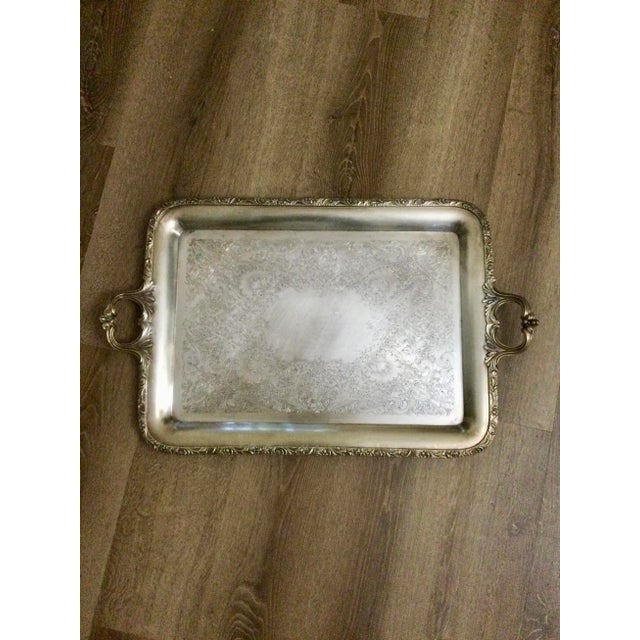 Beautiful vintage rectangular silver plate serving tray by Webster Wilcox with a lovely grapevine and scroll detail at the...