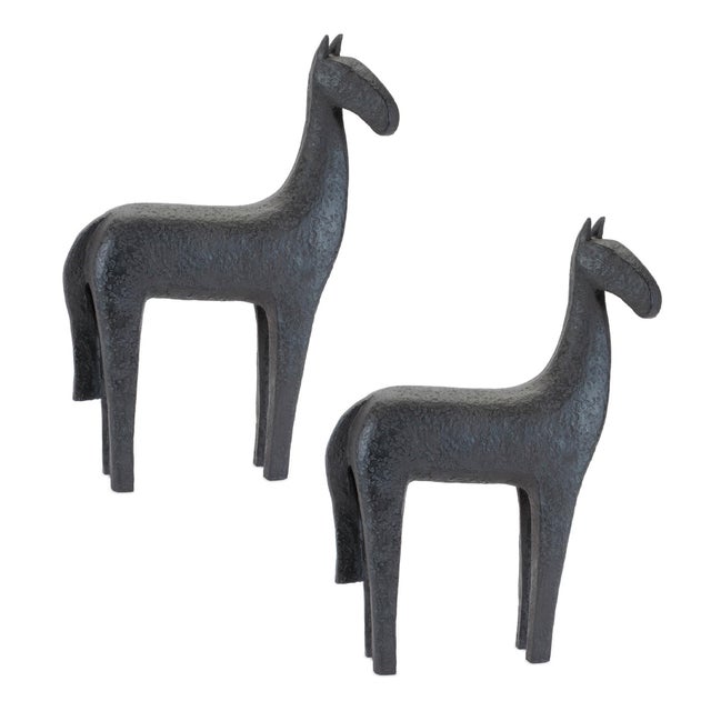 Add a sophisticated, rustic touch to your space with the Modern Horse Statue Set. Crafted from resin with a deep black...