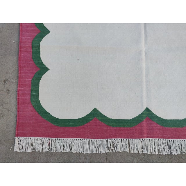 Cream Handmade Cotton Cream, Forest Green and Raspberry Pink Washed Border Scalloped Rug For Sale - Image 8 of 11