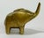 Vintage Mid Century Modern style solid brass elephant paper weight. Clean lines with a charming flair. Patina.