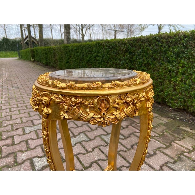 Pair of French Louis XVI Side Tables – 1980s, Gold Beech with Gray Marble Tops Add a refined touch of Parisian...