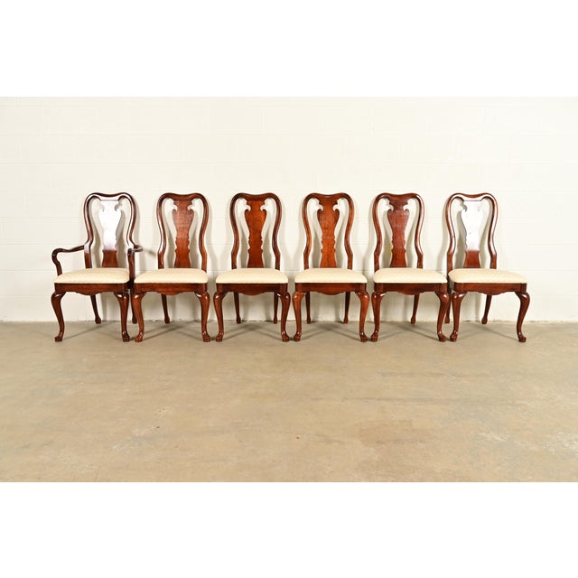 A gorgeous set of six Queen Anne or Georgian style dining chairs By Thomasville USA, Circa 1980s Solid carved mahogany...