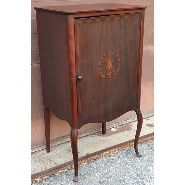 Payne Furniture Company Mahogany and Satinwood Inlaid Sheet Music Cabinet, Circa 1890s Measures 21.5" in width and 17.25"...