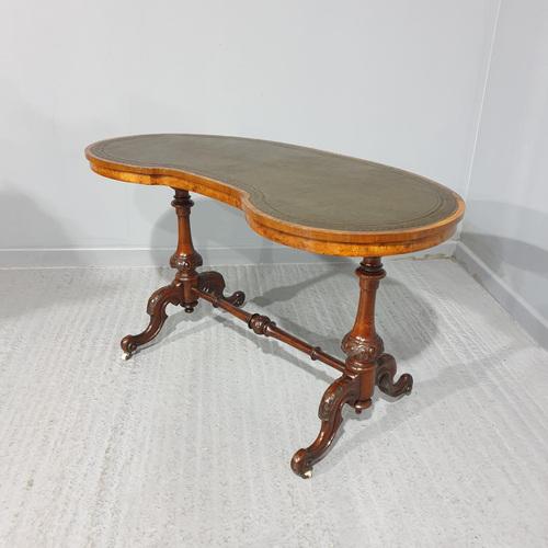 This is a very nice mid 19th Century Victorian antique kidney shaped writing table, standing on double pedestal walnut...