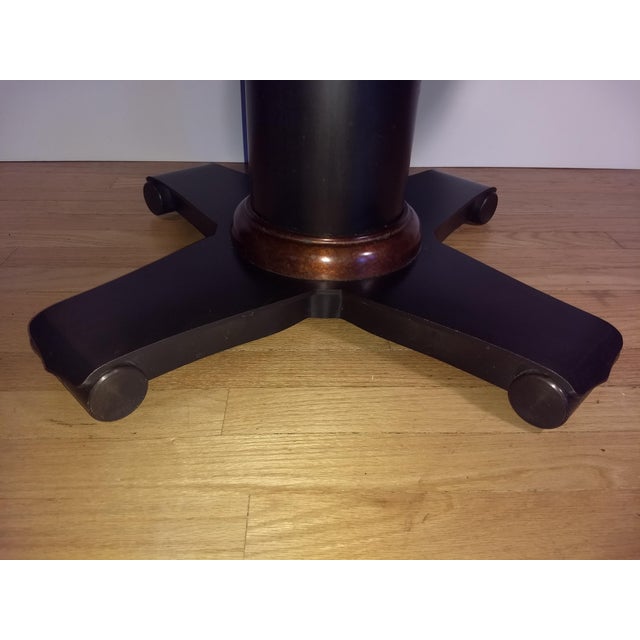 Crate & Barrel Collina Round CopperTopped Coffee Table With Black