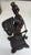 The Antique Bronze Turkey Hearing Challenged Cigar Holder is a unique figurine depicting a turkey with a...