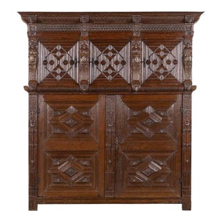 Monumental 17th Century Richly Ornamented and Coffered Flemish Oak Cabinet For Sale