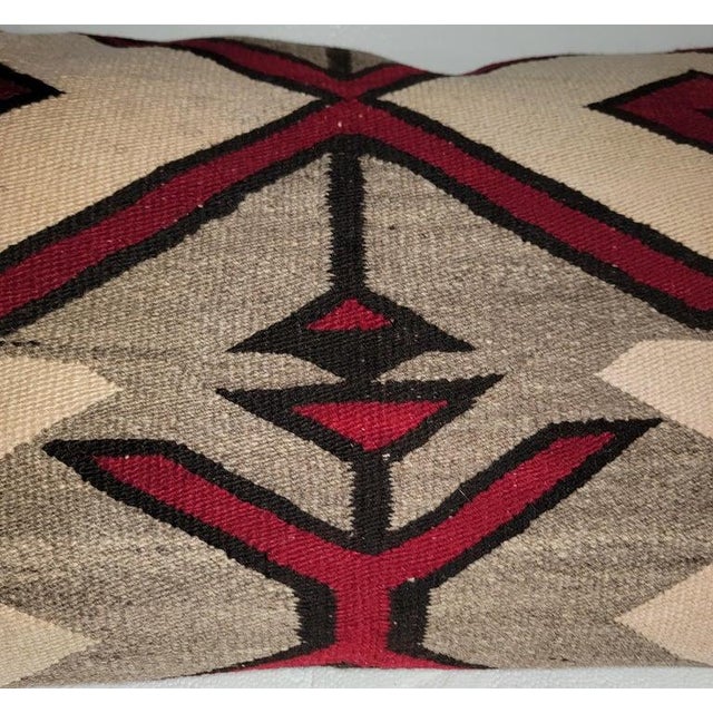 Early Navajo Indian weaving pillow or bolster in fine condition.The backing is in a red soft linen.