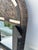 Vintage handmade Moroccan arch door mirror crafted from brass and featuring bone inlay details. The design is reminiscent...