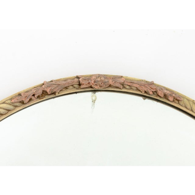 Floral Motif Polychrome Painted Carved Wood Circular Mirror, with rose flower upper and lower crests. Mirror plate: 29"...