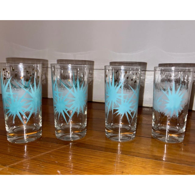 Fabulous set of four mid-century modern atomic drinking glasses. Add an explosion of fun to your everyday!