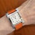Metal Vintage Hermes Heure H 30mm Steel White Dial Orange Swift Strap Quartz Watch For Sale - Image 7 of 7
