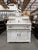 This antique marble and wood washstand has been fully restored. It features a complete mechanism that allows it to...