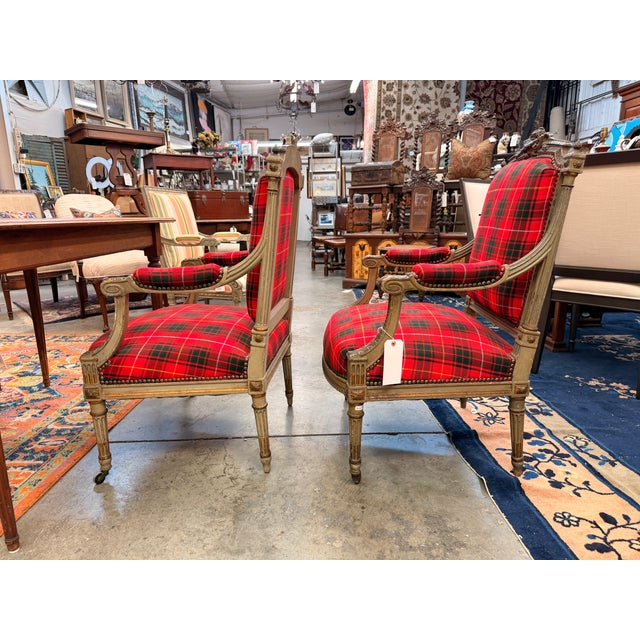 Beautifully capturing the balanced neoclassicism of the era, these authentic antiques feature elegantly carved walnut...