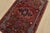 An authentic vintage tribal Hamedan rug hand-knotted with fine wool and natural dyes. This nomadic rug features a central...