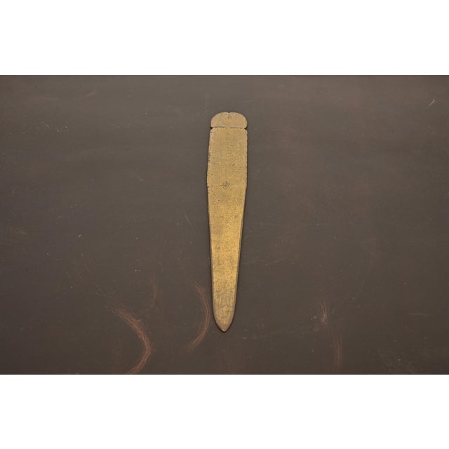 A gorgeous Arts & Crafts period brass finished hand hammered copper letter opener By Roycroft (signed with impressed orb...