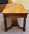 Handsome and Sturdy Oak Library Table with elaborate carving detail. Single drawer on either side of Table for storage. C....