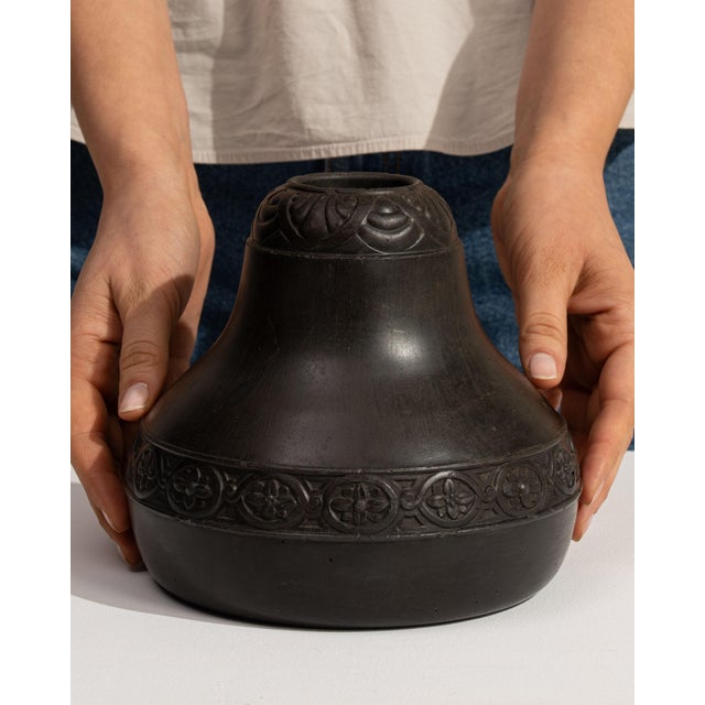 This mid 20th century Art Deco vase from Germany is finished in chocolate, worked in ceramic. Its design carries the Art...