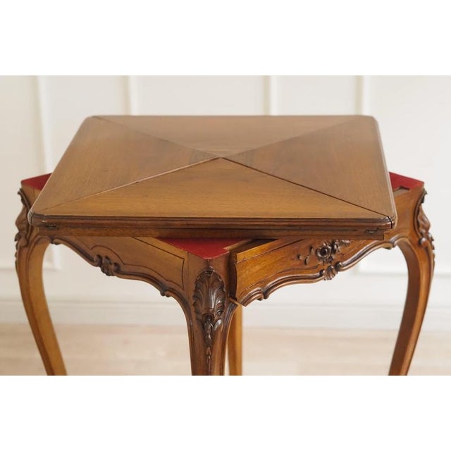 This game table was created around 1890 as a historicist interpretation of the Louis XV style and incorporates the flowing...