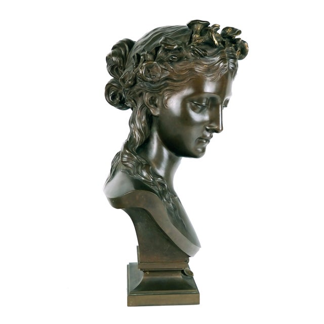 19th Century Ferdinand Barbedienne (1810-1892) Bronze Bust Of A Woman. Bust features head of a woman with long, wavy hair,...