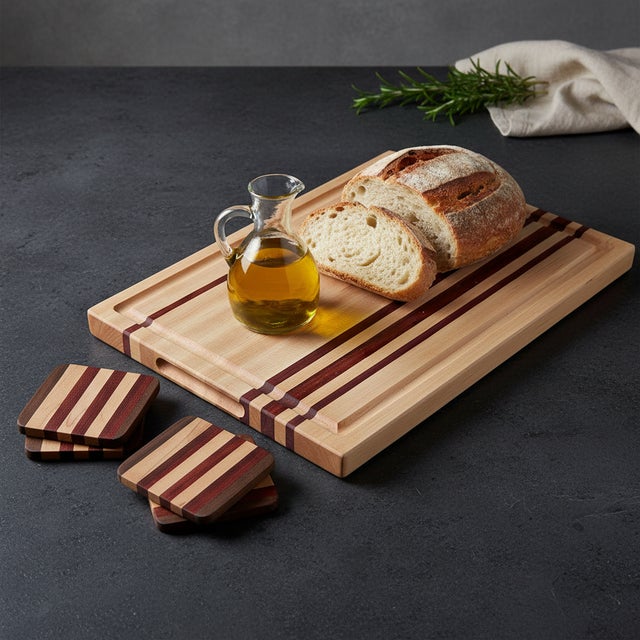 Handcrafted Cutting Board – Premium Edition Elevate your kitchen experience with this artisan cutting board, meticulously...