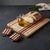 Handcrafted Cutting Board – Premium Edition Elevate your kitchen experience with this artisan cutting board, meticulously...