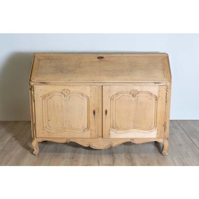 This Early 19th Century French Louis XV Style Secrétaire showcases a timeless and classy blend of functionality and...