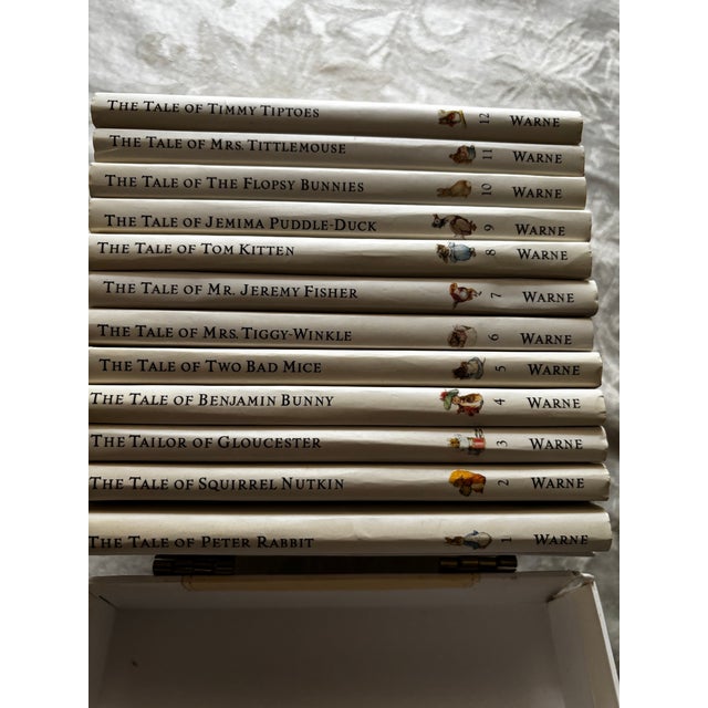 Volumes 1-12 of Beatrix Potter's Tale of Peter Rabbit. All with dust jackets. Books are in excellent condition. The...