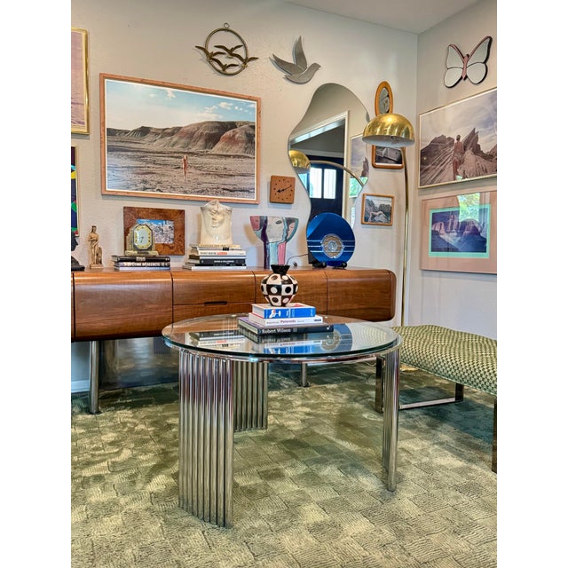 A beautiful art deco futurist chrome coffee table, circa 1970s. Likely produced in Los Angeles by Vermillion, a maker...