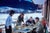 Pizza In The Snow by Toni Frissell A group of friends enjoy an alfresco après-ski pizza, 1959. (Photo by Toni Frissell)...