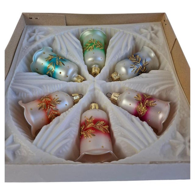 A charming set of six vintage Czechoslovakian glass Christmas bell ornaments, dating to circa 1960. Each bell is...