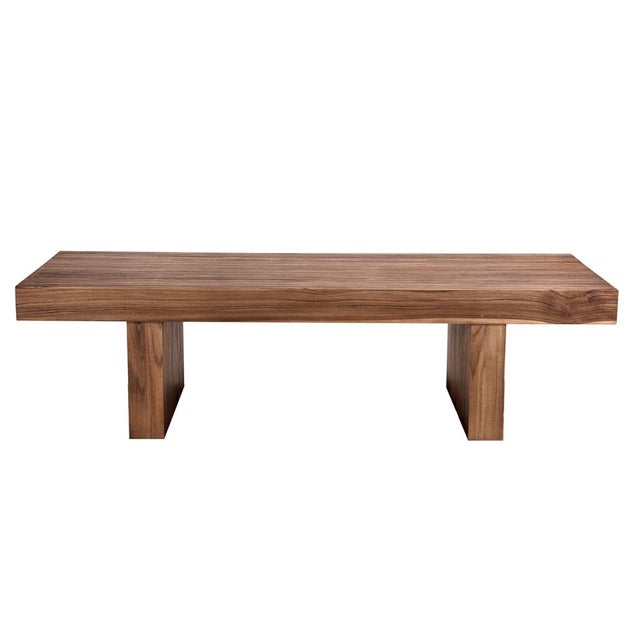 Clean lines meet organic warmth in the Kobe Coffee Table. Crafted from solid teak with a clear flat finish, this statement...