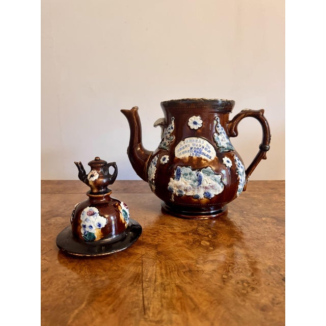 Large unusual antique bargeware tea pot decorated with wonderful bunches of flowers in blue, green, pink and white colours...