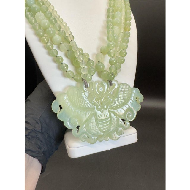 Beautiful Multi-Strand Light Green Jadeite Beaded Necklace. Traditional design in Chinese pieces. Multiple strands of...
