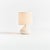 This sweet little ceramic lamp has a curvy silhouette. The wellscaled shade and matte finish complete the look. Perfect...