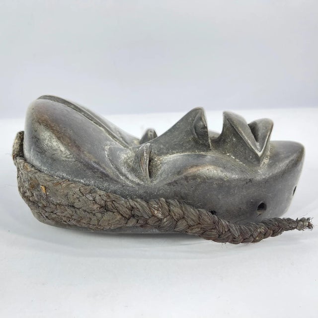 Dan masks, originating from the Dan people of Liberia, CÃ´te d'Ivoire, and Guinea, are recognized for their elongated...
