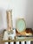 Postmodern clear acrylic jewelry caddy designed as a vertical necklace and accessory holder. The structure features a...