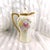 This is a cream color chocolate pot marked JS Germany. I do not know the age or the pattern name. The chocolate pot has a...