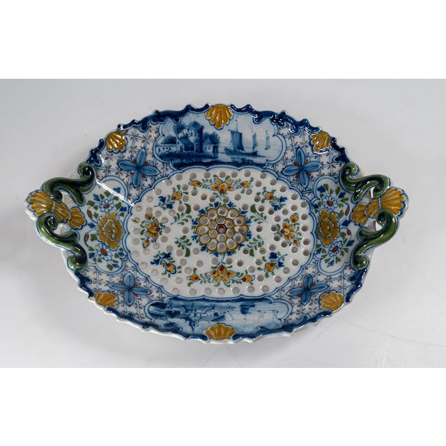 We are selling this great Dutch Delft Faience polychrome dish. This dish is decorated in bright colors with scenes of...