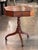 Early 19th century English Regency mahogany work table with an octagonal top and canted corners, crossbanded around the...