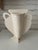 Bloomsbury inspired urn shaped silhouette vase with impressed garden leaves . Soft , romantic vase in cream colored clay...