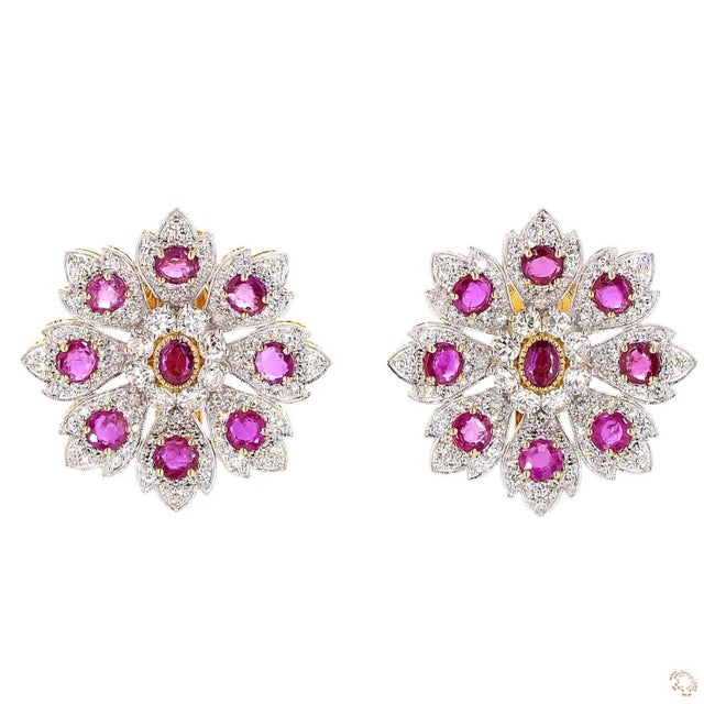 These estate earrings from our contemporary estate collection centers on a 4.02-carat diamond in a round brilliant cut for...