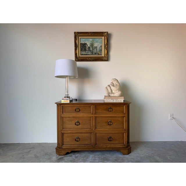 This beautiful vintage four-drawer dresser by Baker Furniture's Milling Road. Expertly constructed from solid wood with a...
