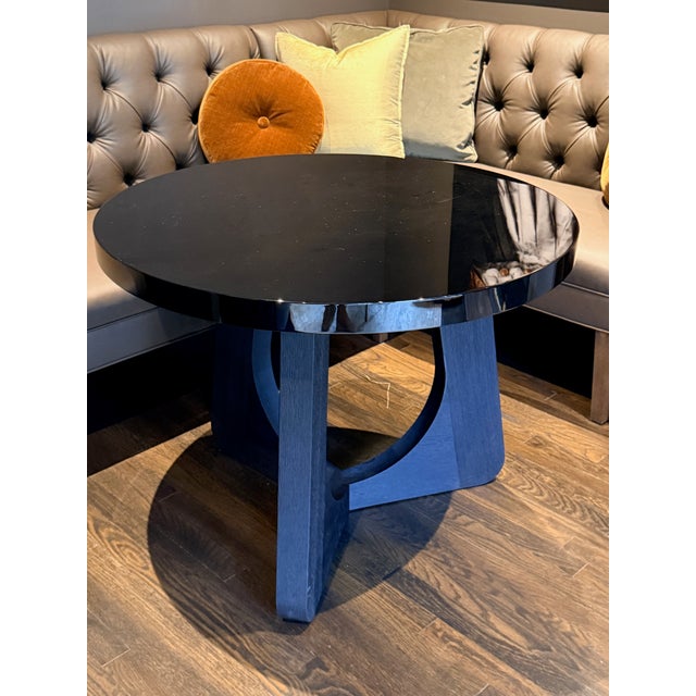 Christian Liaigre Montfaucon Lacquered Side Table A beautiful sculptural table comprised of a stained oak base with a...