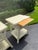 These tables were adapted from a piece acquired by Munder Skiles at a Clifton Nursery in London. Slatted wood tables for...